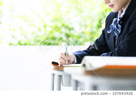 Hands of a junior high school girl studying Hands of a junior high school girl studying 107643926