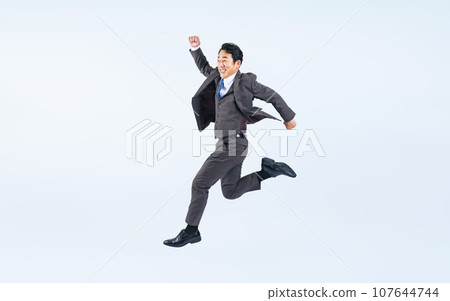 Middle-aged businessman jumping (Cutout PNGs are also on sale! See author profile) Middle-aged businessman jumping (Cutout PNGs are also on sale! See author profile) 107644744