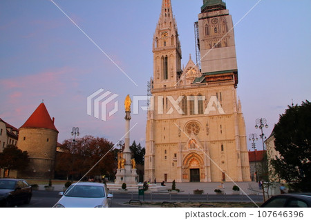 Evening view of the Cathedral of the Assumption of the Virgin Mary with its two high spires in the Kaptol district of Zagreb, the capital of Croatia in southern Europe 107646396