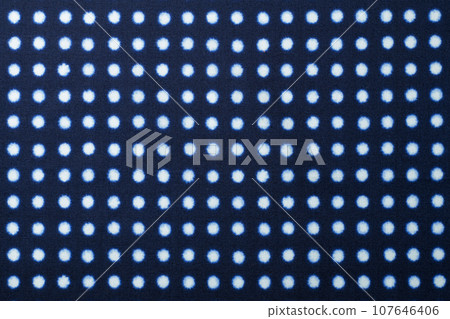 Fabric background texture with polka dots 107646406