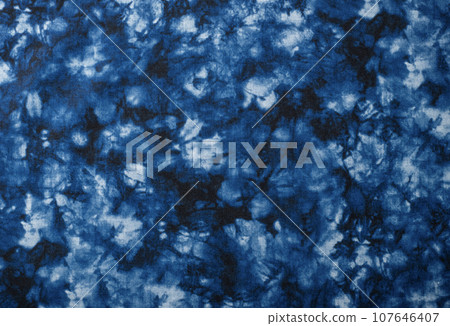 Blue tie-dye fabric background texture Blue tie-dye fabric background texture 107646407