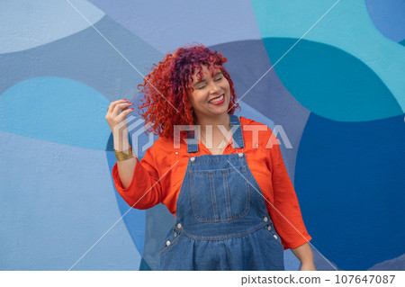 Brazilian woman with colour hair 107647087