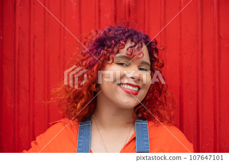 Portrait of the Brazilian woman with colour hair 107647101