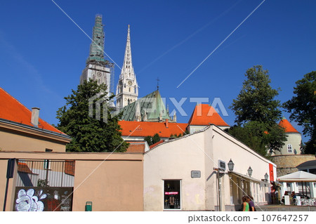 The two spiers of the Cathedral of the Assumption of the Virgin Mary, a symbol of the Kaptol district of Zagreb, the capital of Croatia in southern Europe The two spiers of the Cathedral of the Assumption of the Virgin Mary, a symbol of the Kaptol district of Zagreb, the capital of Croatia in southern Europe 107647257