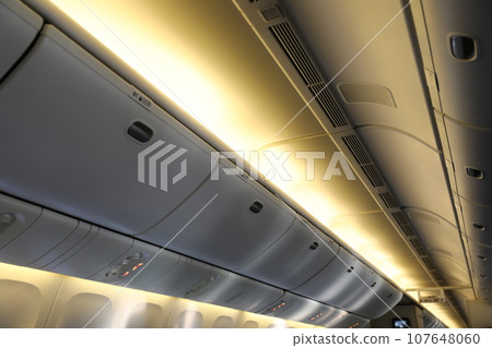 Interior of a jet aircraft. Interior of a jet aircraft. 107648060