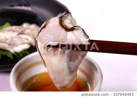 eat raw oysters eat raw oysters 107648463