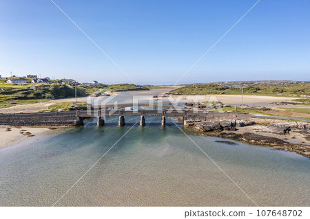 Aerial view of the bridge over the Atlantic to Cruit Island, County Donegal, Ireland Aerial view of the bridge over the Atlantic to Cruit Island, County Donegal, Ireland 107648702