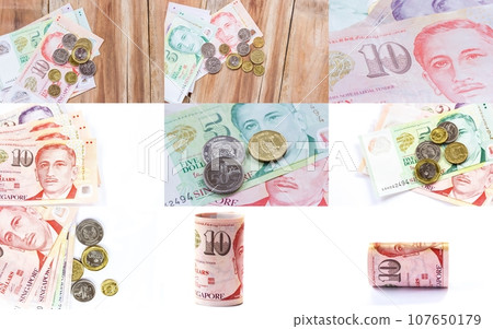 Singapore money on wooden table background Singapore money on wooden table background 107650179
