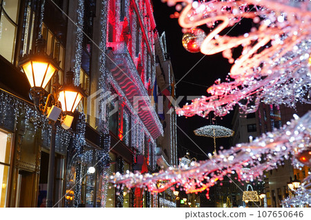 Street in a Christmas night in an old European town Street in a Christmas night in an old European town 107650646