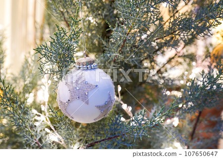 Christmas tree with white ball. Scandinavian decor. Christmas background Christmas tree with white ball. Scandinavian decor. Christmas background 107650647