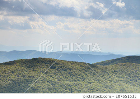 Nature. Green mountain landscape in the summer Nature. Green mountain landscape in the summer 107651535