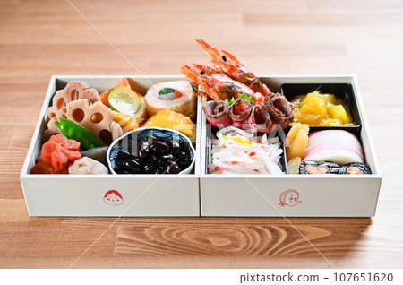 Simple handmade osechi for two people packed in a white box Simple handmade osechi for two people packed in a white box 107651620