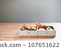 Simple handmade osechi for two people packed in a white box 107651622
