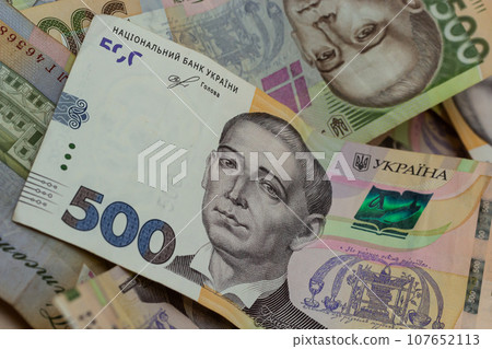Money of Ukraine. Background of Ukrainian hryvnia banknotes. Hryvnia 500, 200. Uah. Money and saving concept 107652113