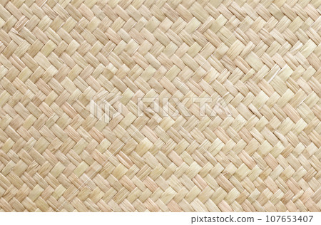 Pattern of old reed weaving mat with vintage style for background and design art work. 107653407