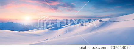 featuring fresh ski tracks on a snowy slope at sunrise, with warm oranges and cool blues blending in the sky. 107654033