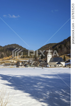Landscape with church (Cerkev Rozenvenske Marije) near Bohinjska Bistrica, Slovenia 107655253