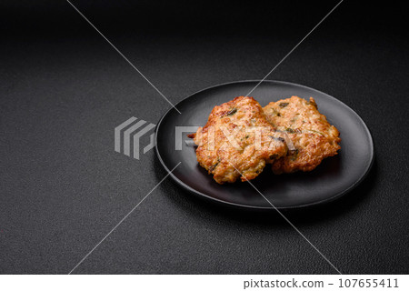 Delicious fried chicken chop or pork meat fried breaded with salt, spices and herbs Delicious fried chicken chop or pork meat fried breaded with salt, spices and herbs 107655411