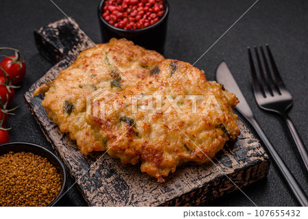 Delicious fried chicken chop or pork meat fried breaded with salt, spices and herbs 107655432