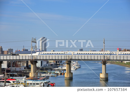 [Aichi Prefecture] Nagoya cityscape Tokaido Shinkansen seen from Horikawa Kizaemon Bridge in Minato Ward 107657384
