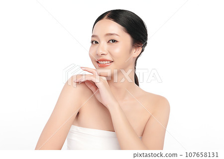 Beautiful young asian woman with clean fresh skin on white background, Face care, Facial treatment, Cosmetology, beauty and spa, Asian women portrait. Beautiful young asian woman with clean fresh skin on white background, Face care, Facial treatment, Cosmetology, beauty and spa, Asian women portrait. 107658131