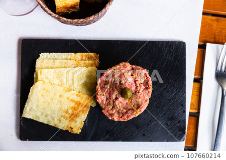 Raw veal tartare Raw veal tartare 107660214