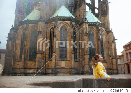 smiling woman in Prague Czech Republic having walking tour smiling woman in Prague Czech Republic having walking tour 107661043