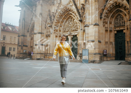 smiling woman in Prague Czech Republic having excursion 107661049