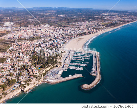 Aerial view of Torredembarra with port 107661405
