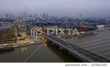 Cityscape of Warsaw with Swietokrzyski Bridge at dusk Cityscape of Warsaw with Swietokrzyski Bridge at dusk 107662083