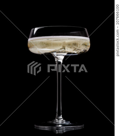 Champagne glass on a black 107666100