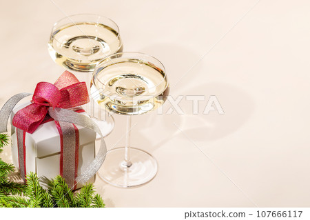 Two champagne glasses and gift box Two champagne glasses and gift box 107666117