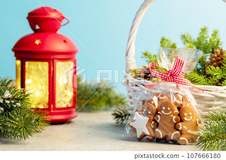 Christmas gingerbread cookies and garland lights Christmas gingerbread cookies and garland lights 107666180
