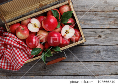 Wooden box with fresh red apples Wooden box with fresh red apples 107666230