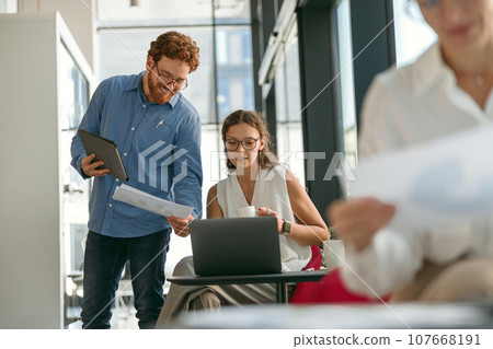 Business people working together on project in office while use laptop. Teamwork concept 107668191