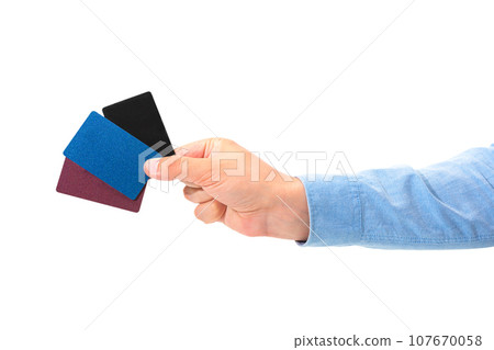Businessman male hand with cards in hand isolated on white background Businessman male hand with cards in hand isolated on white background 107670058