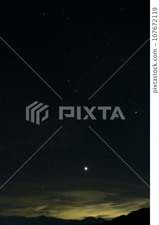 A bright morning star rising in the early morning sky in Hakushu-cho, Hokuto City 107672119