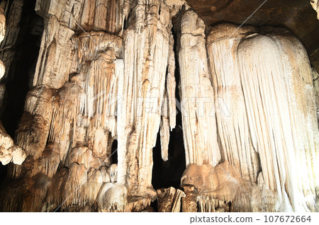Stalagmites and stalactites inside the beautiful Phu Wai cave. Located at Uthai Thani Province in Thailand. 107672664