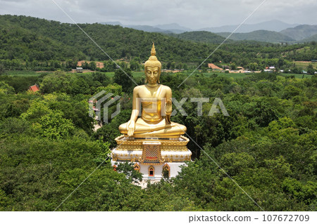 Luang Pho To, Wat Pha Thang, is a Buddha image enshrined outdoors in the Prathanphon posture. It is installed prominently and can be observed from a distance. Luang Pho To, Wat Pha Thang, is a Buddha image enshrined outdoors in the Prathanphon posture. It is installed prominently and can be observed from a distance. 107672709