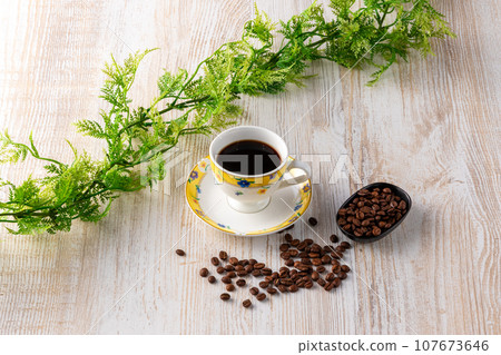 Hot coffee and coffee beans Hot coffee and coffee beans 107673646