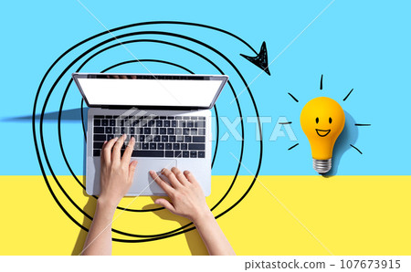 Creativity, inspiration, idea concept with light bulb and laptop computer Creativity, inspiration, idea concept with light bulb and laptop computer 107673915