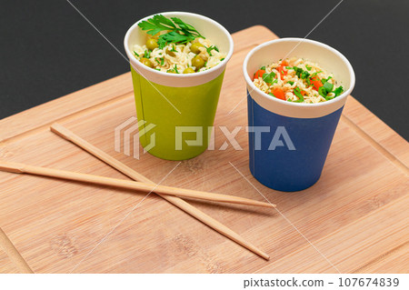Prepared Instant Noodles with Green Pea, Carrot and Greens Prepared Instant Noodles with Green Pea, Carrot and Greens 107674839