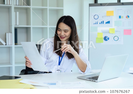 Close up bookkeepers working with balance sheet to analyze problems and find solutions to bringing develop business Close up bookkeepers working with balance sheet to analyze problems and find solutions to bringing develop business 107676267