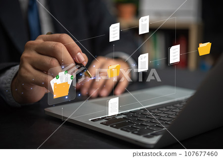 Document Management System or DMS. information technology IT working on laptop.Internet Document management Storage and Technology Concept. Document Management System or DMS. information technology IT working on laptop.Internet Document management Storage and Technology Concept. 107677460