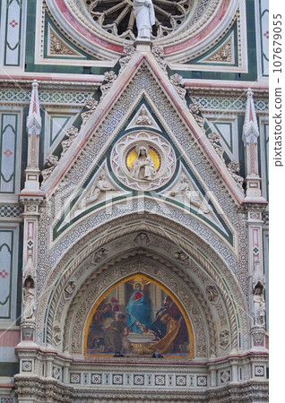 Details of the exterior of the di Santa Maria del Fiore or Cathedral of Saint Mary of the Flower - the main church of Florence, Tuscany, Italy. Details of the exterior of the di Santa Maria del Fiore or Cathedral of Saint Mary of the Flower - the main church of Florence, Tuscany, Italy. 107679055