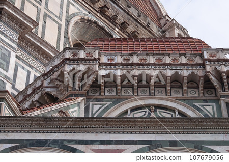 Details of the exterior of the di Santa Maria del Fiore or Cathedral of Saint Mary of the Flower - the main church of Florence, Tuscany, Italy. Details of the exterior of the di Santa Maria del Fiore or Cathedral of Saint Mary of the Flower - the main church of Florence, Tuscany, Italy. 107679056