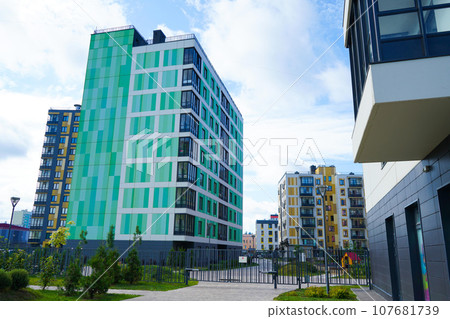 Facade of a multi-storey building. Fragment 107681739