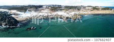 Aerial shot of “Aomori Prefecture” Hachinohe City/Tanesashi Coast in winter 107682407