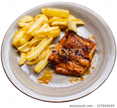 Spanish Secreto de cerdo - roasted pork served with potatoes Spanish Secreto de cerdo - roasted pork served with potatoes 107684649
