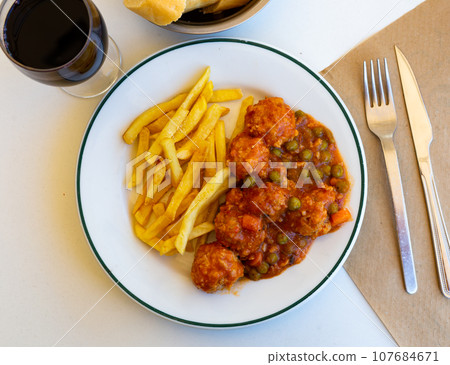 Meatballs and french fries Meatballs and french fries 107684671